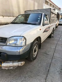 نيسان تاک • موديل 2010 • قفل رباعي