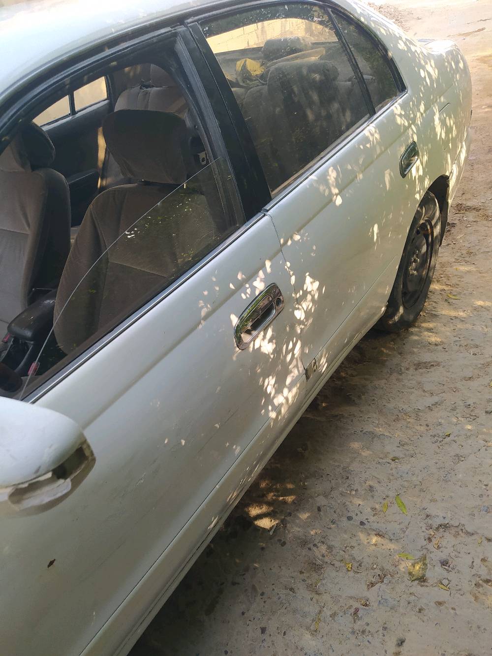 كرونة نفخ 2000المكينة حاوية كير مابي شي حدادية زينة بور باتري وتايرات جدد رقم بغداد سنوية مامنتهية لاكصة ولاضربة عوزهة تصحيح للسنوية رقم بغداد مديل 95 تبريد شغال عنوانه النجف المشخاب عليهة غرامة 200