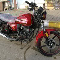 طوز خورماتوو كوماري • موتوسيكل