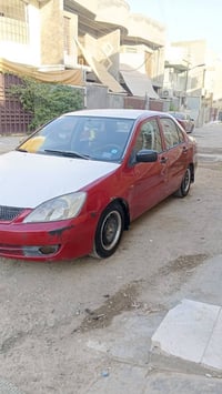 لانسر 2007 رقم ذي قار دولي سنوية وهزة جديدة السيارة جاهزة محرك قبق اسو...