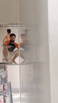 الموصل • لبخ جص • ٥ عمال