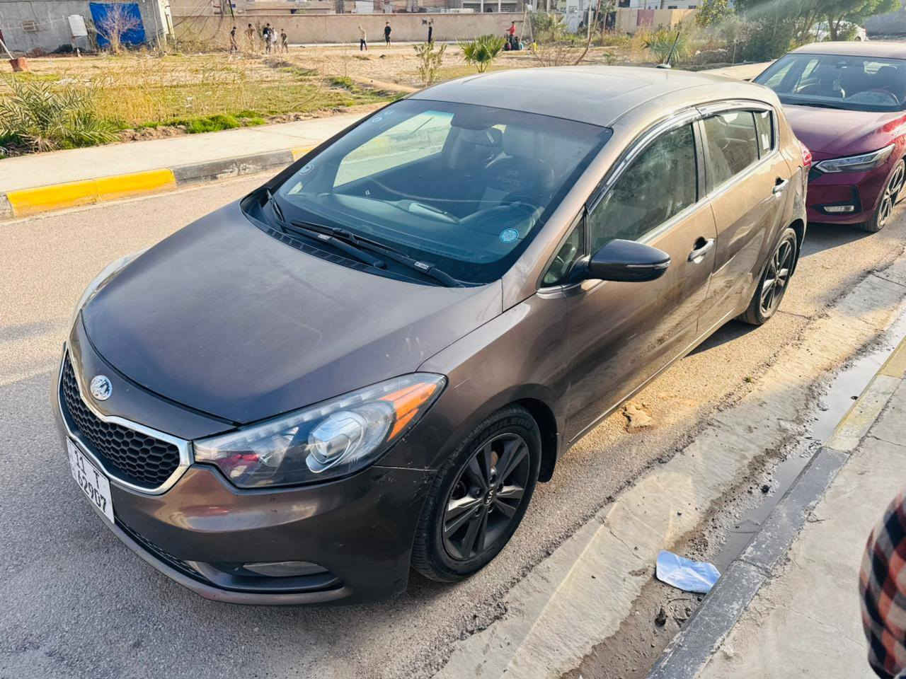 السلام عليكم  كيا فورتي 5 هاج باك موديل ٢٠١٤ وارد  للبيع    ..رقم بغداد انكليزي  فول مواصفات  
- حجم المحرك 1800  GDi
‎2- سلايد فتحة بالقمارة 
‎3-بصمات بالابواب والصندوك وبصمة تشغيل 
‎4- نظام ترحيب عند الاقتراب من السيارة في اليدات 
‎5-  اشاير بالمري 
‎ويل كب حجم16 
7- لايت امامي عدسة + زنون بلادي 
‎+ لد امامي + بلوجكتر   
‎_8 تحكم ستيرن اربع جهات +تدفئه+ كروس سرعة 
9_ نظام  قيادة سبورت+ نورمال كومفورت  ايكو 
‎10_كشن السايق كهربائي  ميموري حفظ وضعيات + كشنات جلد 
‎ تدفئة بالكشنات تبريد بالكشنات  الكشن الخلفي ثلاث قطع وقلاب وتدفئه 
‎سعرهه107 وبيها مجال 
‎السيارة اعلى فئة بالفورتي مواصفات فول الفول واحد على واحد EX 
رقم ***********
 المكان بغداد حي الجهاد
