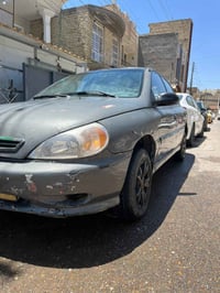 للبيع كيا ريوا موديل 2001  كير اوتماتيك  محرك 1600 رقم بغداد دولي باسم...