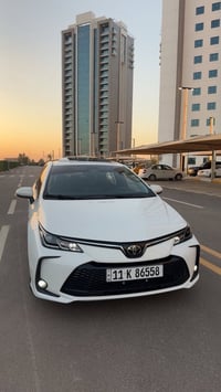 للبيع كورلا هايبرد  موديل: 2025 رقم بغداد تحويل ثاني يوم محرك 1800 هاي...