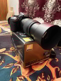 نيكون d5200 وياها عدستين 18.55 و 70.300 شتر 19 ملحقاته كاملة رايدها 45...