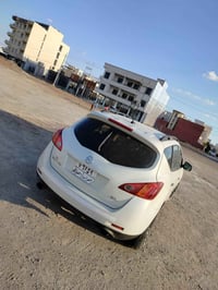 نيسان مورانو 2009 بي قطع و نص  رقم دهوك سعر 75 مجال  موبايل 0750422644...