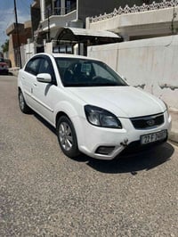 السعر 100 وبيها مجال كيا ريو2012 محرك 16  تبريد شغال  كير اوتو  بالنسب...
