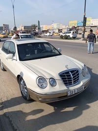 ‏كيا اوبيروس 2005 ‏أعلى فئه فول مواصفات  ‏رقم بابل نكليزي سنويه 2029 ب...