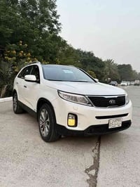 بيع فقط كيا سورنتو خليجي كويتي  موديل ٢٠١٤ لون ابيض صدفي رقم بغداد بسم...