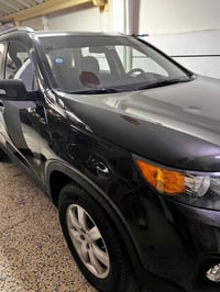 سورنتو 2012  جديده وارد امريكي كلين  تايتل   رقم بغداد لون زيتوني   مح...