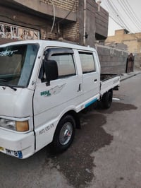 كيا دبل قمارة موديل 95 كير ومكينه وشاصي مكفولات تخم تاير الرقم بغداد م...