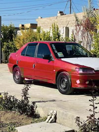 بيجو ٢٠٠٢ • محرك جدد • رقم بغداد