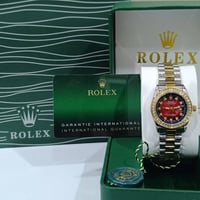 روليكس نسائي • 18K مختم • مقاوم ماء