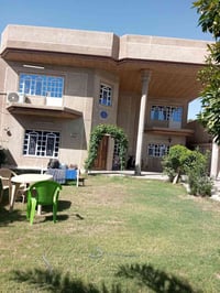 دار للبيع في بغداد منطقة شاطئ التاجي، مساحته 450 متر  مطل على الشارع ي...