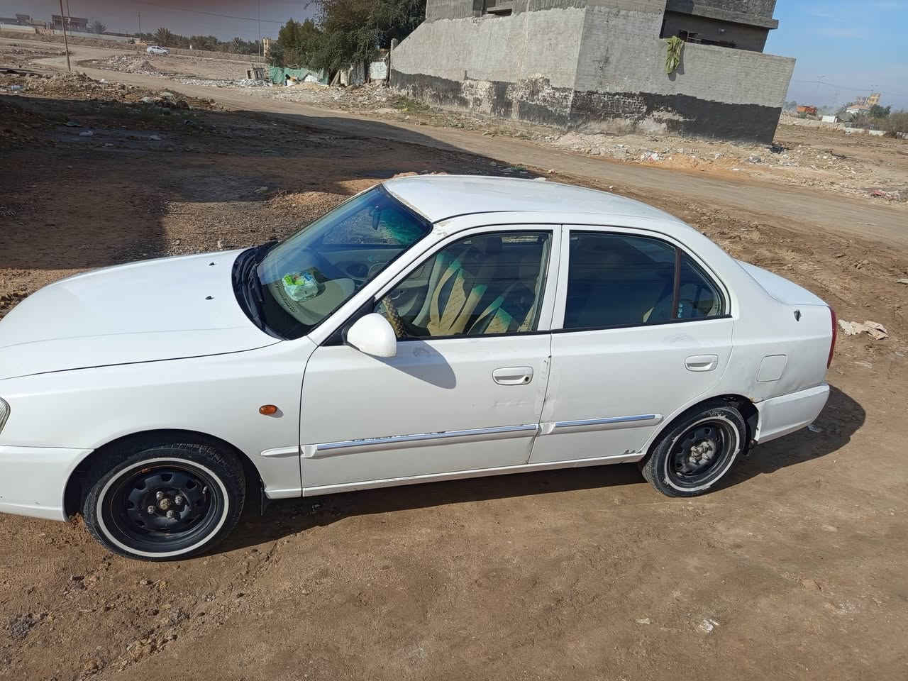 هونداي فيرنا موديل ١٤ خصوصي ابيض بأسمي رقم دولي السعر ٦٥ ورقه مكان بابل مركز ❤️ رقم تلفون *********** واتساب غير متواجد على الفيس  سياره جاهزه تدفئه وتبريد خير من الله

