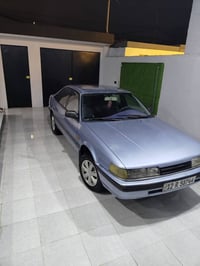 مازدا للبيع ..626 موديل 1990 بأسمي وبيها كابون بانزين .. كير ومكينه شر...