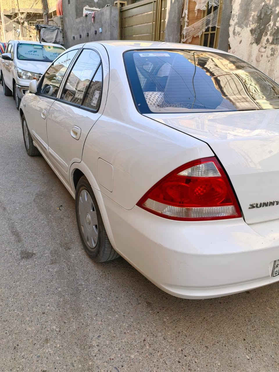 نيسان صني موديل 2012رقم ذي قار دولي سنويه جديده لغايه 2030 وهزه جديده مكفوله من الضربه التبديل   عده  مقدمه البنيد فقط شرط بس الربع مال البنيد مو كله.   و بيه كتاب فحص مكينه وكير  كفاله شرط منضومه تبريد جديده شرط  تبريد ثلج حداديه جديده تخم تاير جديد جاهزه للأخير السعر 105 وبيه مجال للشراي للاستفسار الاتصال على الرقم ***********
