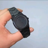 ساعة فخمة اسود فحمي بسعر 15 الف و التوصيل مجانا