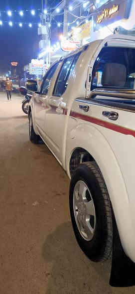 سلام عليكم نيسان نافارا  2010 LE اتوماتيك بغداد انكليزي بسمي سنوية 27 ماشية 137 الف حقيقي   تخم تاير لايت زينون فوك وجوة  شاشة اندرويد تحكم ستيرن  كروز سرعة  ضرر جاملق امامي جهة السايق ومعمر نفسة كير محرك خير من الله لا نتقيص ولاتبخير  السعر 110 عنواني بغداد***********
