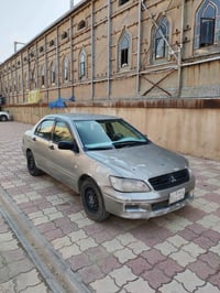 لانسر • محرك وگير نظيف • تبريد غاز