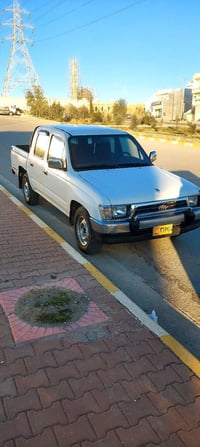 تويوتا • ٢٠٠٠ • احمر