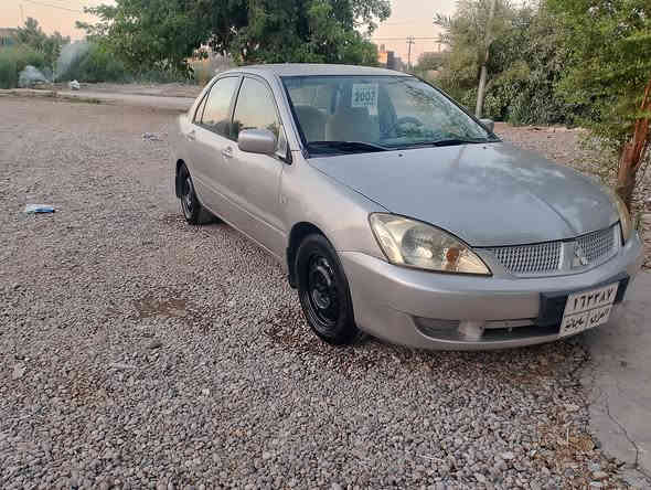 لانسر 2007 مکینە بچوك حیزام بۆیاخ بی معجۆن بی لی دراو بۆجوانی کراوە گیرمکینە تبریدبشرت سعری 65ورقه شوین کلار***********
