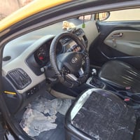 كيا ريو 2015 سياره مكفوله بفط بنيد سياره بسمي  07726544741