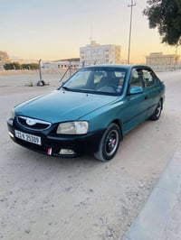 اكسنت ٢٠٠٠ • مصبوغة • قابل تفاوض