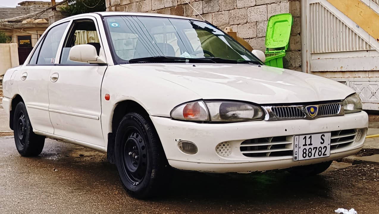 بروتون للبيع موديل 2002 سياره بدون صبغ ما بيه ضربه رقم انكليزي بغداد كير عادي سعر  45او بي مجال بسيط مكان ديالى بلدروز رقم الهاتف ***********
