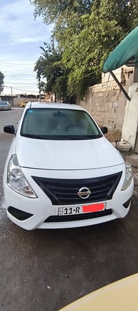 نيسان سني 2022 نضيفه كلش  (رقم بغداد) دولي باسمي  ماشيه 83 كم  شاشه أن...