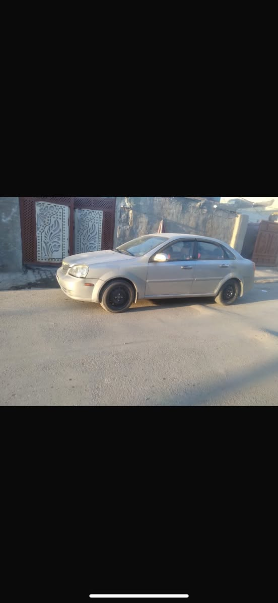 فورنزة ٢٠٠٧ رقم انكليزي باسمي كاملة ما بيها حادث  بيها بس جاملغ الامامي  والخلفي صبغ فقط محرك كايم السعر ٤٢وبيها مجال مكاني بغداد المعامل الحسينية شراي يتصل رقم ***********
