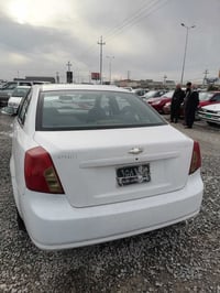 سلام و علێکم ئۆپترا مۆدێل 2005گێڕ عادی قفڵ مە رکە زی جام کارە بای دوو ...