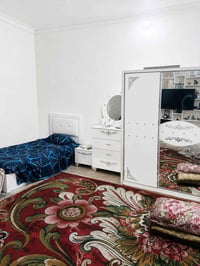 غرفة نوم • أم نفر