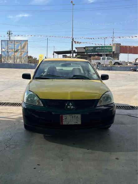 لانسەر ٢٠١٠  مەکینە گەورە سەنەوی پلاستیک سەیارەکە زۆر پاکە لێدران و بۆیاخی نیە گێر و مەکینە بە شەرت براوە و موس نیە  سەیارەی مەعرەز نیە مالی دۆستە سعری ٥٠ و مەعامەلەی برایانە      رەقەم.   *********** شمشمل
