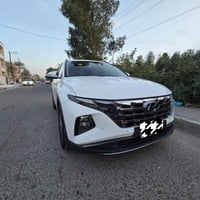 توسان 2022 خليجي رقم بغداد  فول موصفات عدا الفتحه محرك 2000 دووورش بصم...