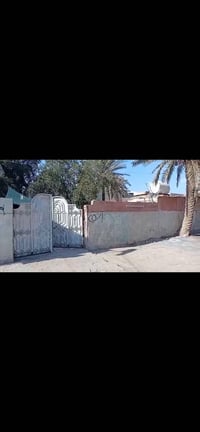 دار للبيع معسكر الرشيد دور ضباط منطقه سكنيه ماعليها ازاله تجاوز600 متر...