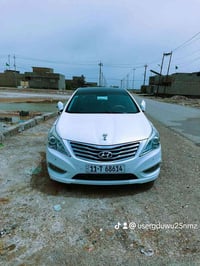 ازيرا موديل 13 خليجي رقم بغداد   شاشه سياره فول سعرها 115 07715695380