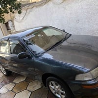 كورلا موديل 1992سياره مكينه وكير مكفولته مكفوله من ضربه بيه صبغ جمليه ...