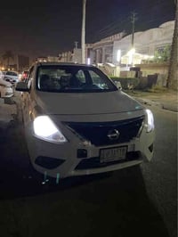 نيسان سني   ابيض موديل 2021 للبيع   او مراوس  رقم بغداد. ماشية 130الف ...