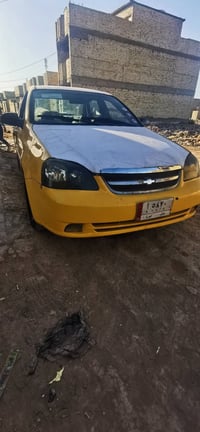فورنزا موديل 2008 كير مكينة مكفولات صدر جديد كهربائيات كلها شغالة مصفر...
