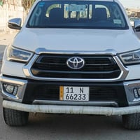 هايلوكس 2021 مكفولة رقم بغداد بسمي كامره خلفيه حساسات خلفيه  تبريد كشن...