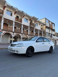 البيع اوبتره موديل 2011 بيها قطع صبغ ابيع حزام وبيها جاملغ خلفي بدون د...