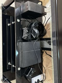 بلي 4 مهكر فات مع الملحقات ups ويدتين وحدة اصلي والثاني تجاري وسماعة و...