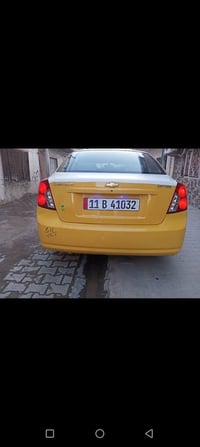 سياره أوبترا للبيع موديل  2011 الشركه العامه كير محرك جدد تبريد ثلج سي...