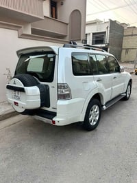 باجيرو مديل 2014 مكفوله ماشيه 131 عنوان بغداد سعر 150 07700655465 فول