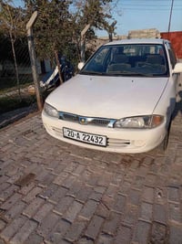 بروتون موديل ٢٠٠٢ كير عادي عل وضع الشركة بلاد كير محرك تبريد بيها بس ب...