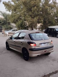 بيجو ٢٠٦ • رقم بغداد • كفالة