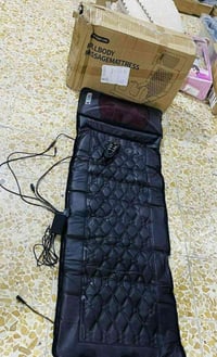 دوشك تدليك مع تدليك رقبه جديد ما مستخدم  سعره ٦٠ الف 07833642813