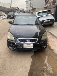 كياا ريو 2011 خليجي  محرك 1.4 كيو اوتو تحكم جهتين  رقم بغداد  بيهة صبغ...