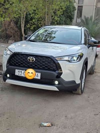 يتوفر كورلا كروس ٢٠٢٥ مرقم بغداد هايبرد مكينة ٢٠٠٠✅️ اخوان السيارة فول...